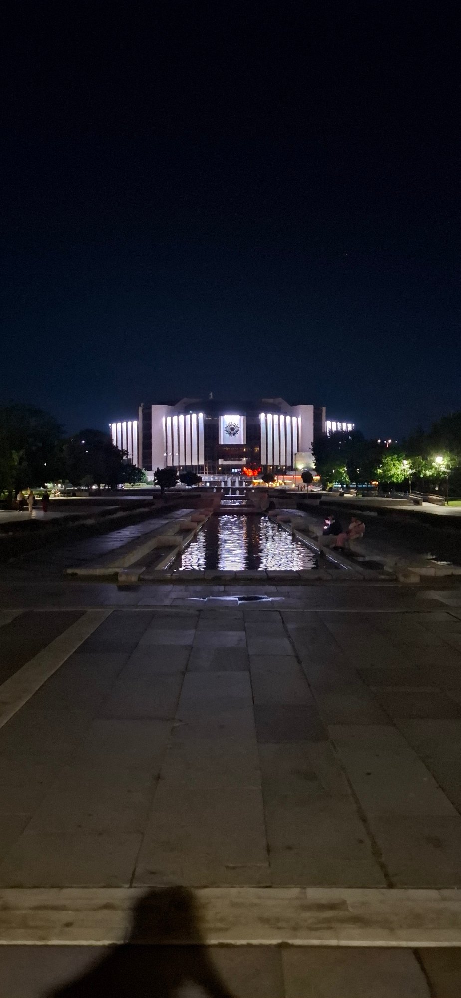 Sofia's National Palace of Culture glowing after dark