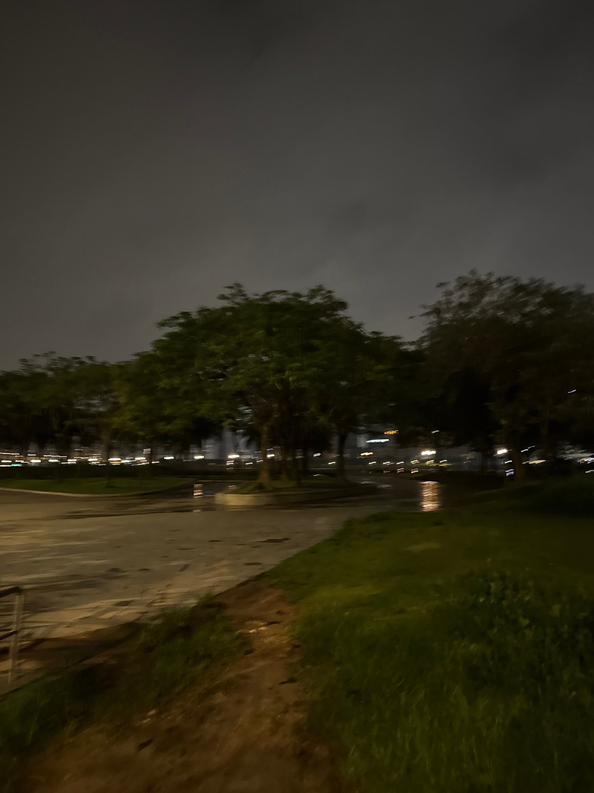 Late evening stroll along Haizhu's waterfront, Guangzhou skyline glowing