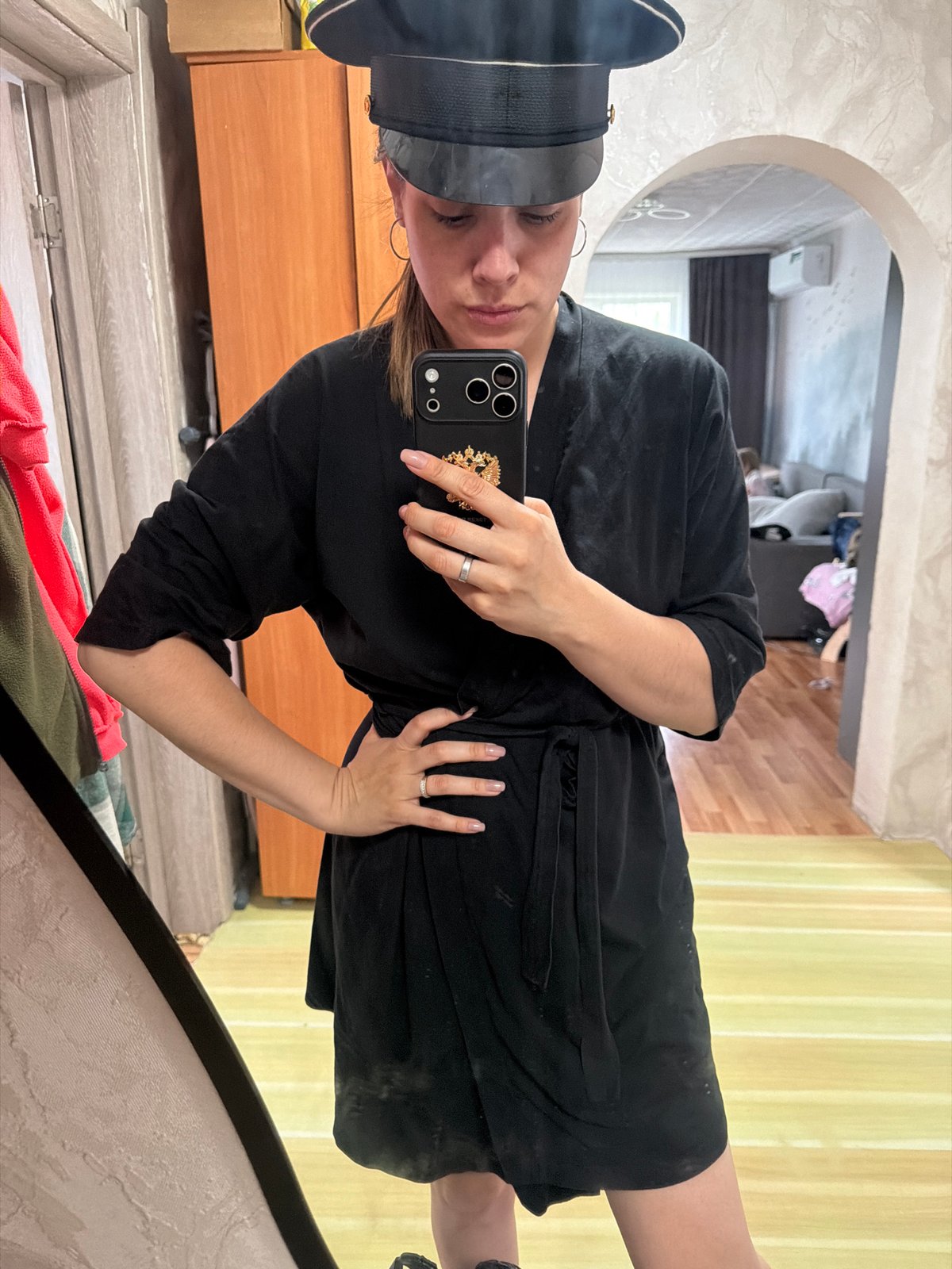 Woman Takes Multiple Mirror Selfies in Sergeyevka Home