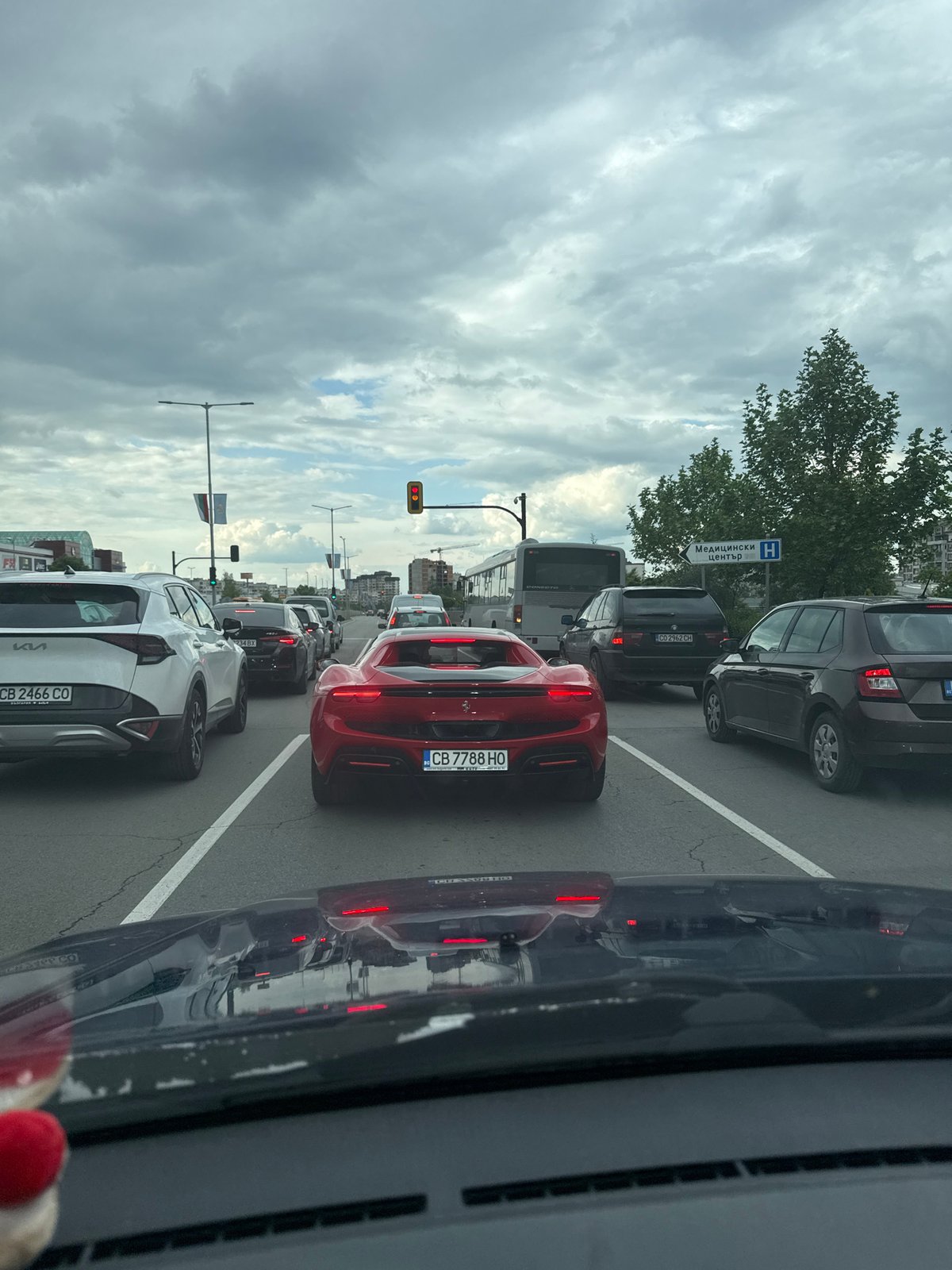 Red Ferrari caught in Sofia traffic jam
