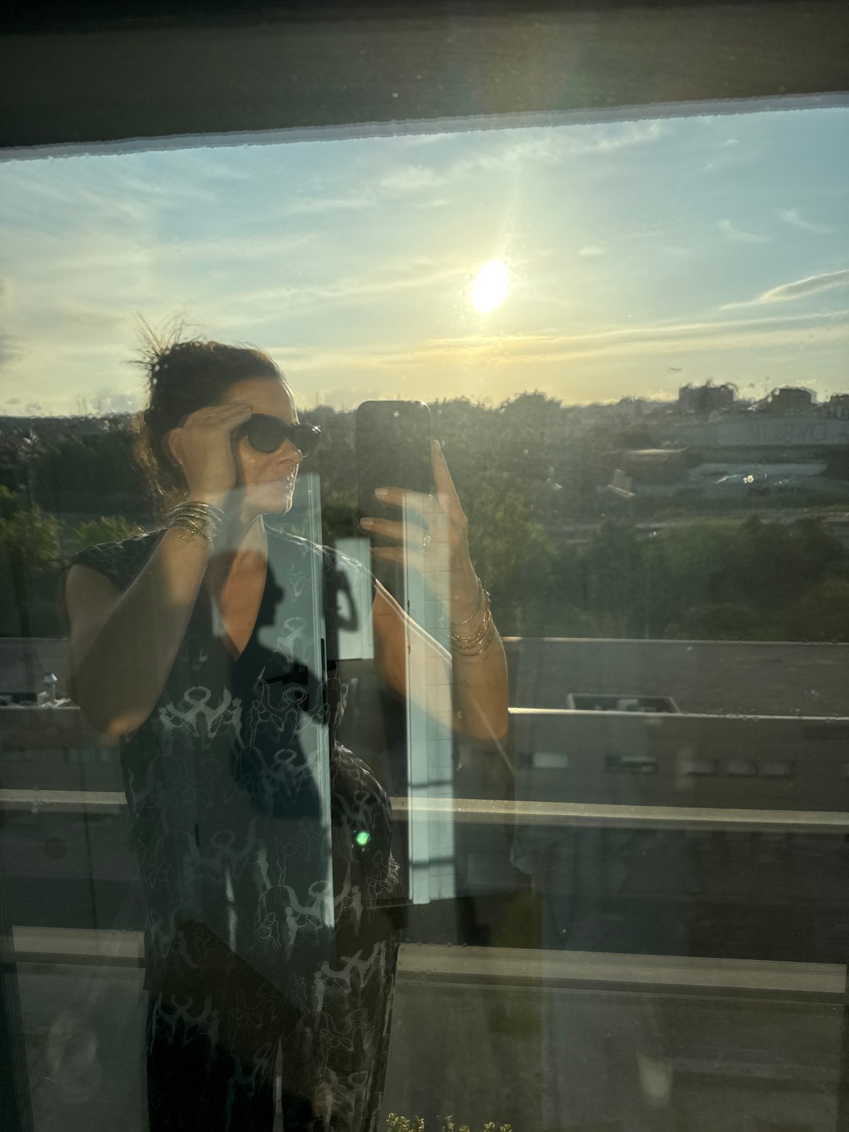 Person observed through window in Loures, Portugal