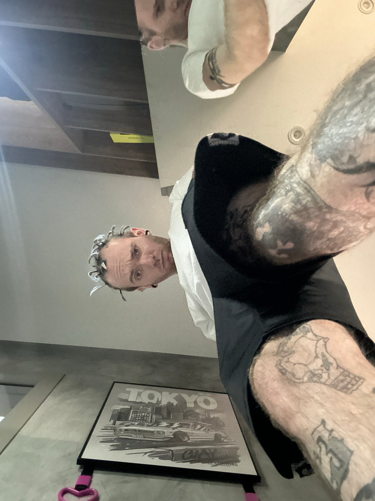 Tattooed person photographed from unusual angle in Khimki