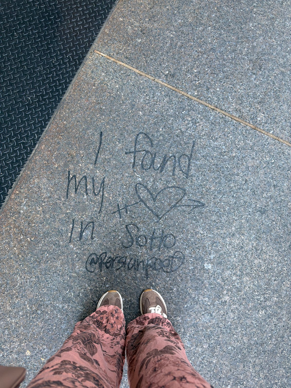 Love graffiti spotted on NYC pavement references Soho Persian food