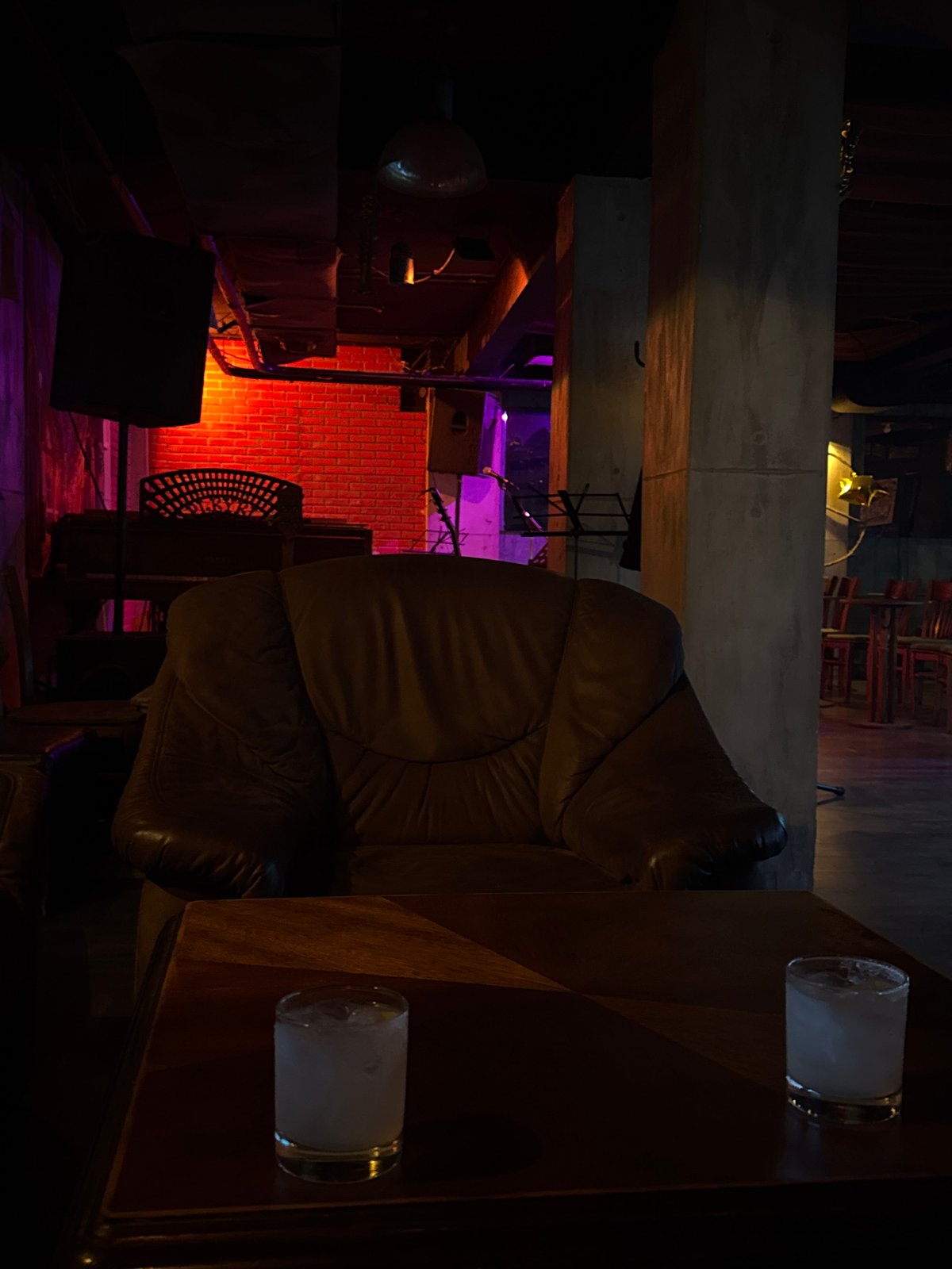 Person grinds metal tool in Sofia bar, sparks fly