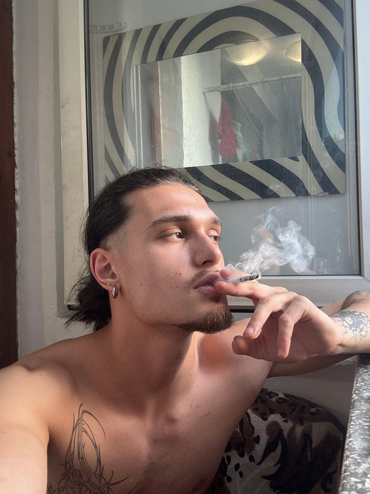 Sofia witness captures smoking man, fabric work, dramatic skies