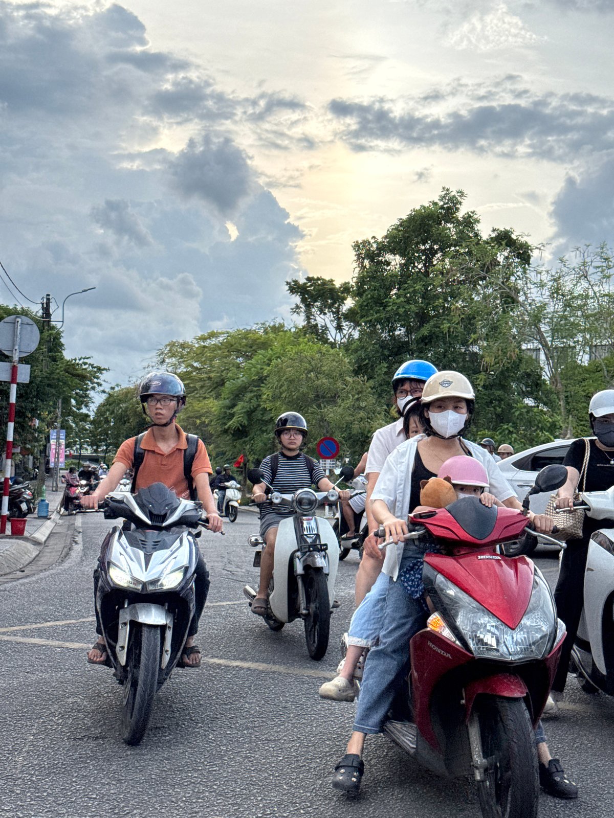 Street traffic and daily movement near Huế's Ho Chi Minh Museum