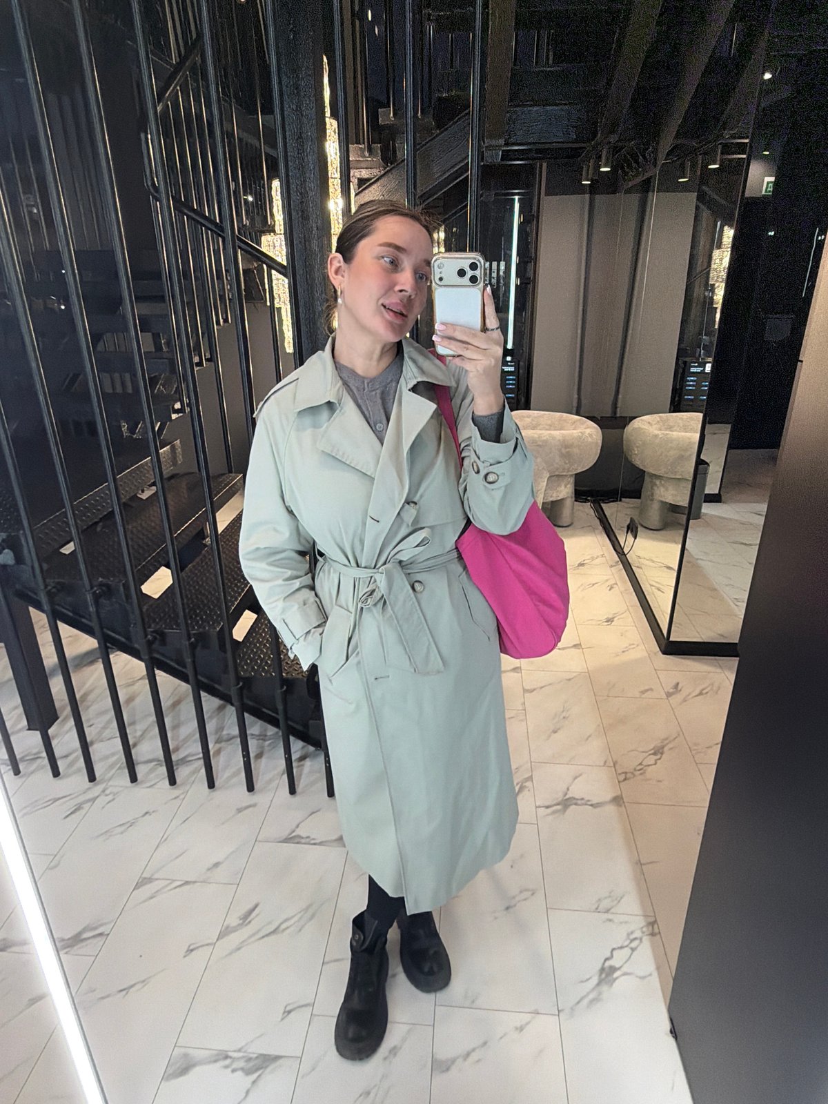 Woman takes selfie at Moscow's Mercury Tower
