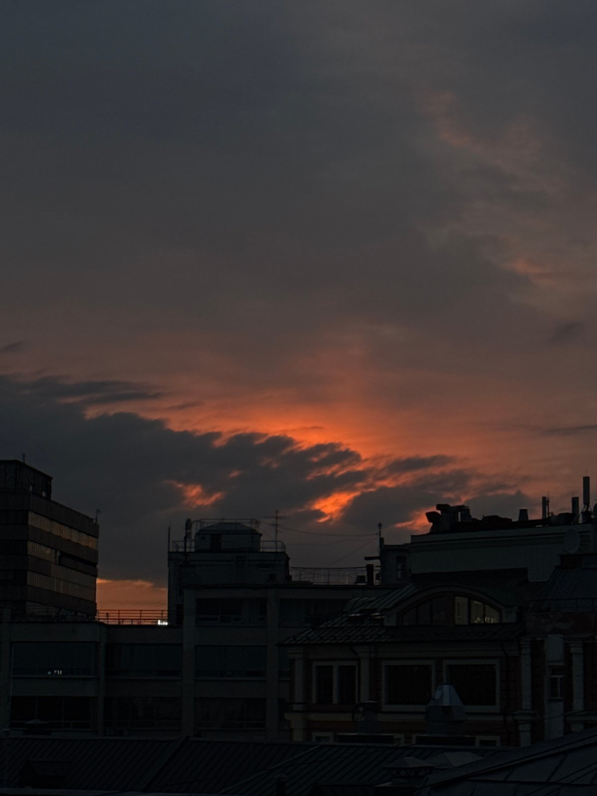Dramatic sunset photographed across Moscow rooftops May 15