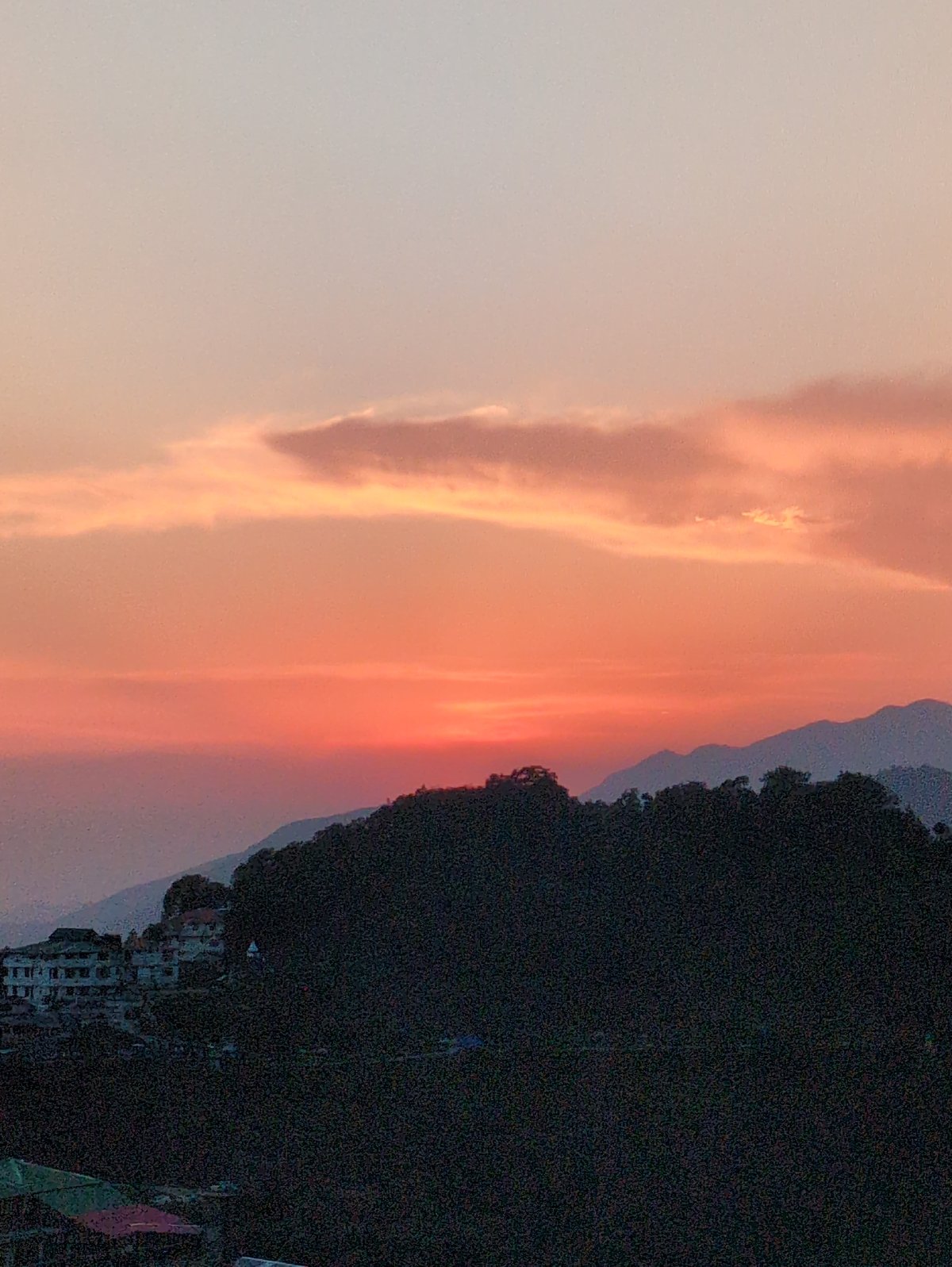 Sunset views across Naddi's rolling hills and residential clusters
