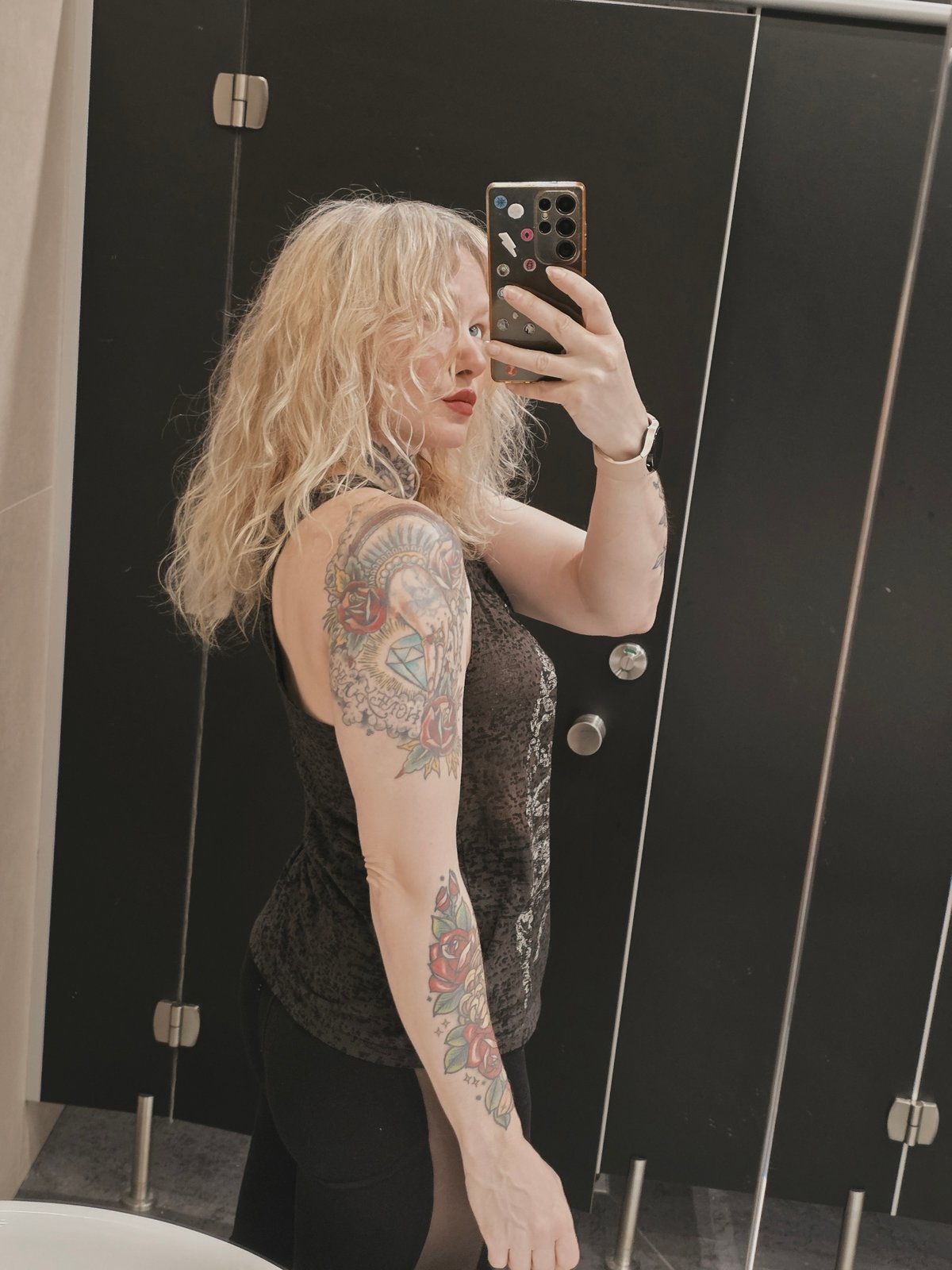 Person Takes Selfie in Saint Petersburg Public Restroom