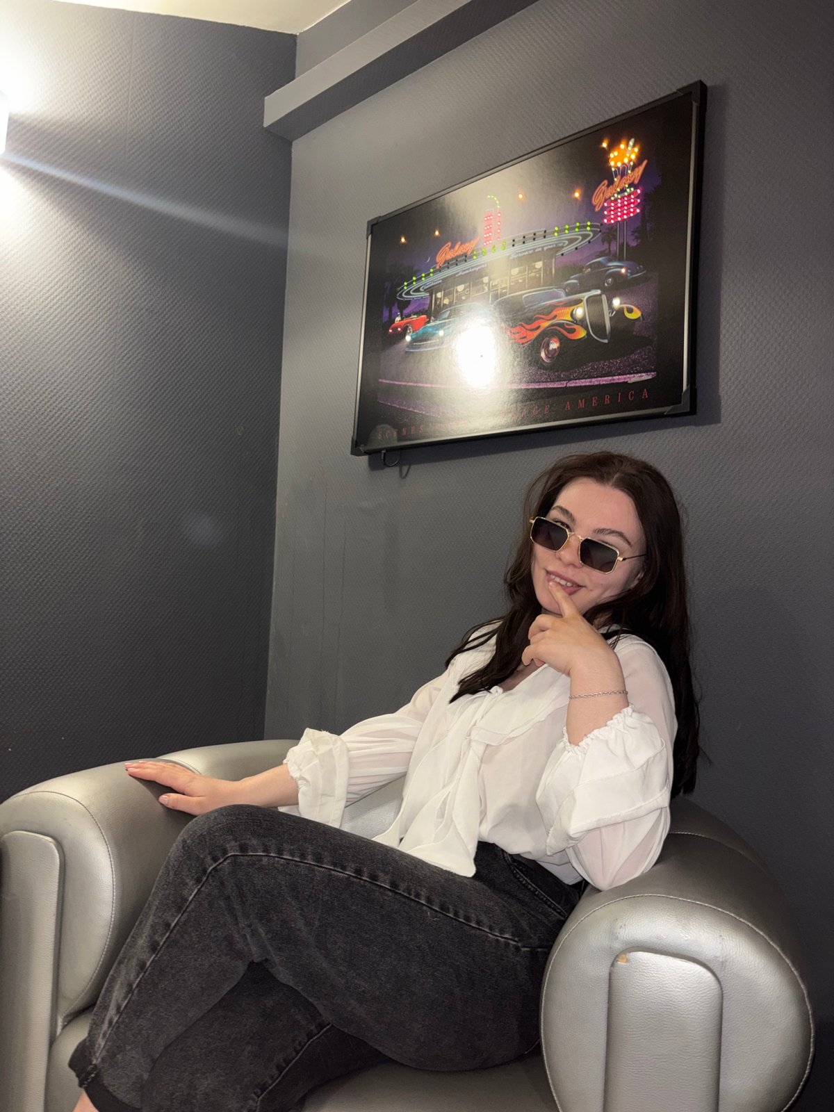 Woman poses for photos at Perm shopping mall