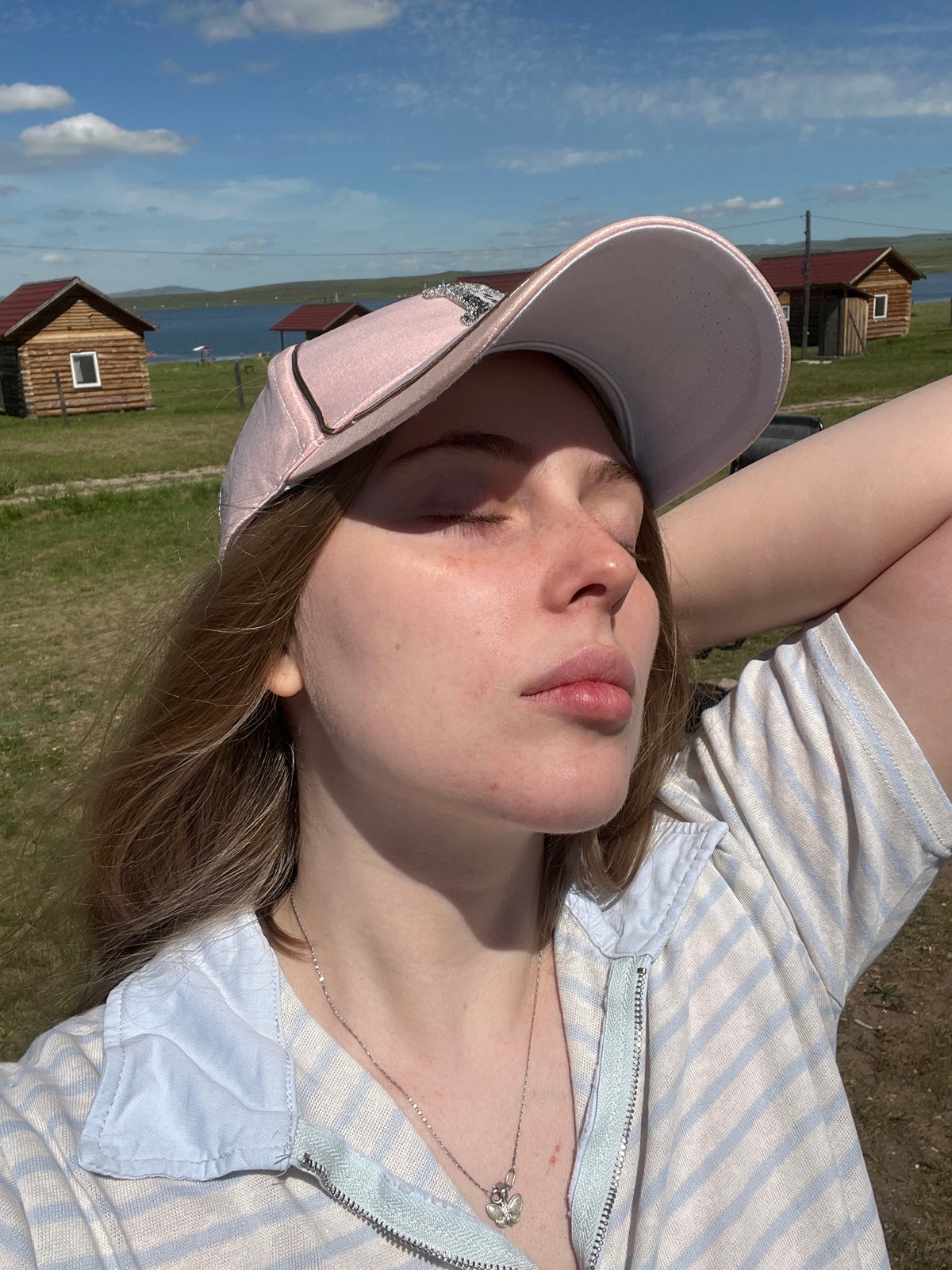 Sunny lakeside afternoon with flowers and swimwear