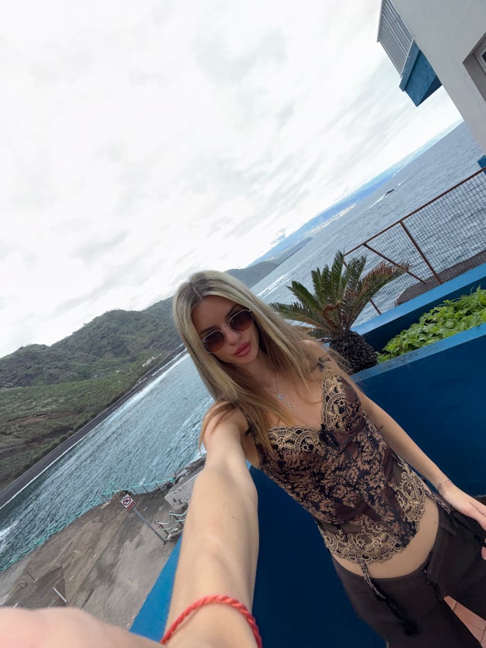 Woman Takes Selfies at Mesa Del Mar Coastal Viewpoint