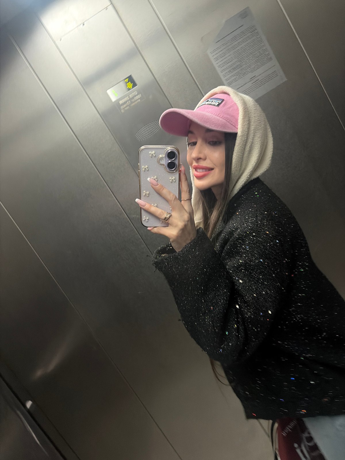 Woman takes elevator selfies in Saint Petersburg