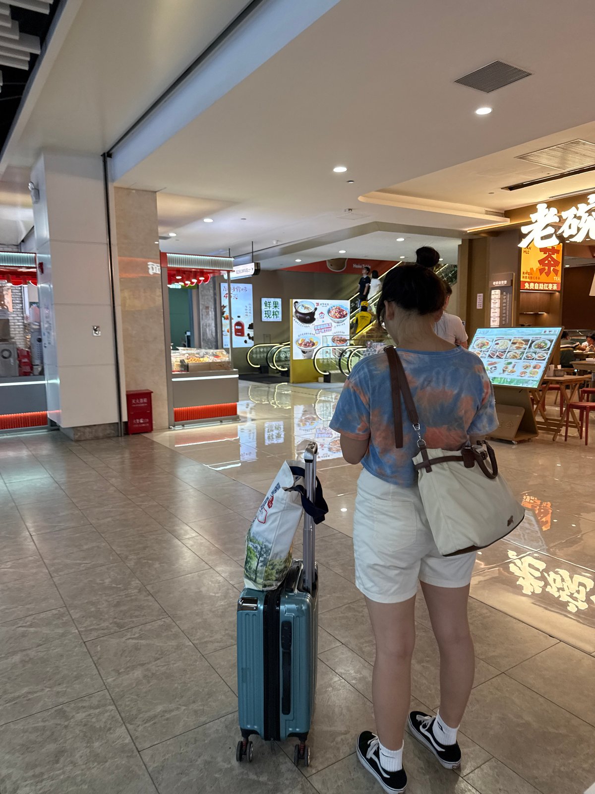 Inside a Haizhu District mall, food spots and foot traffic