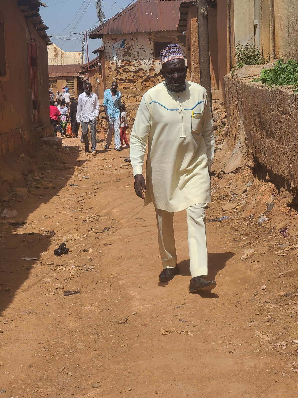 Street life documented across urban area during afternoon hours