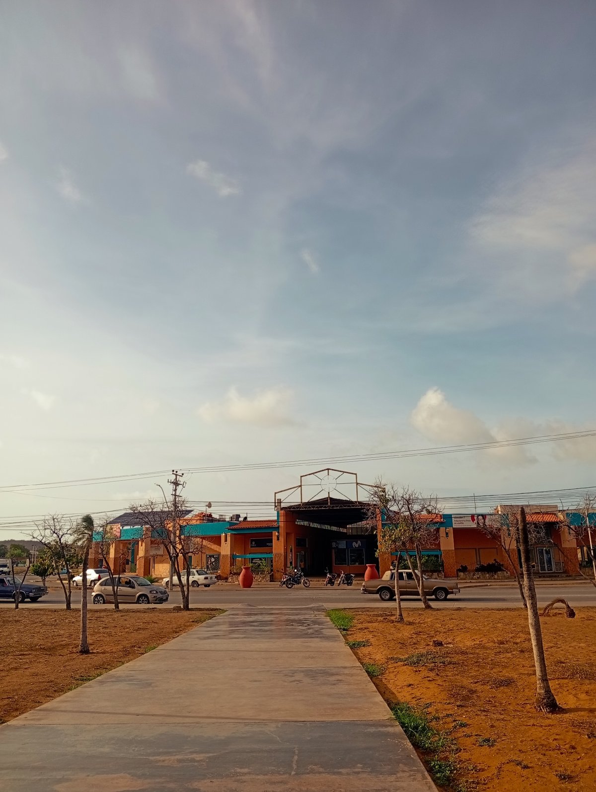 Evening around Juan Griego: supermarket run, waterfront dusk, local streets