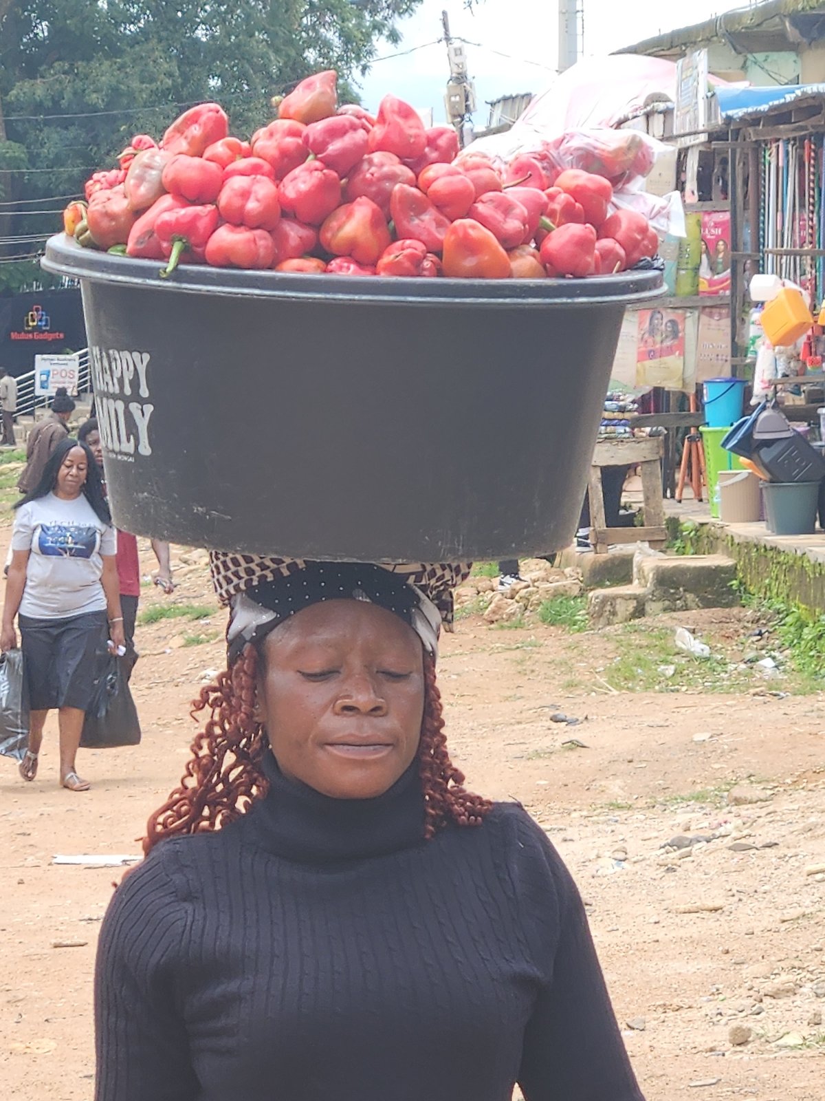 Street life and commerce in a busy urban African market