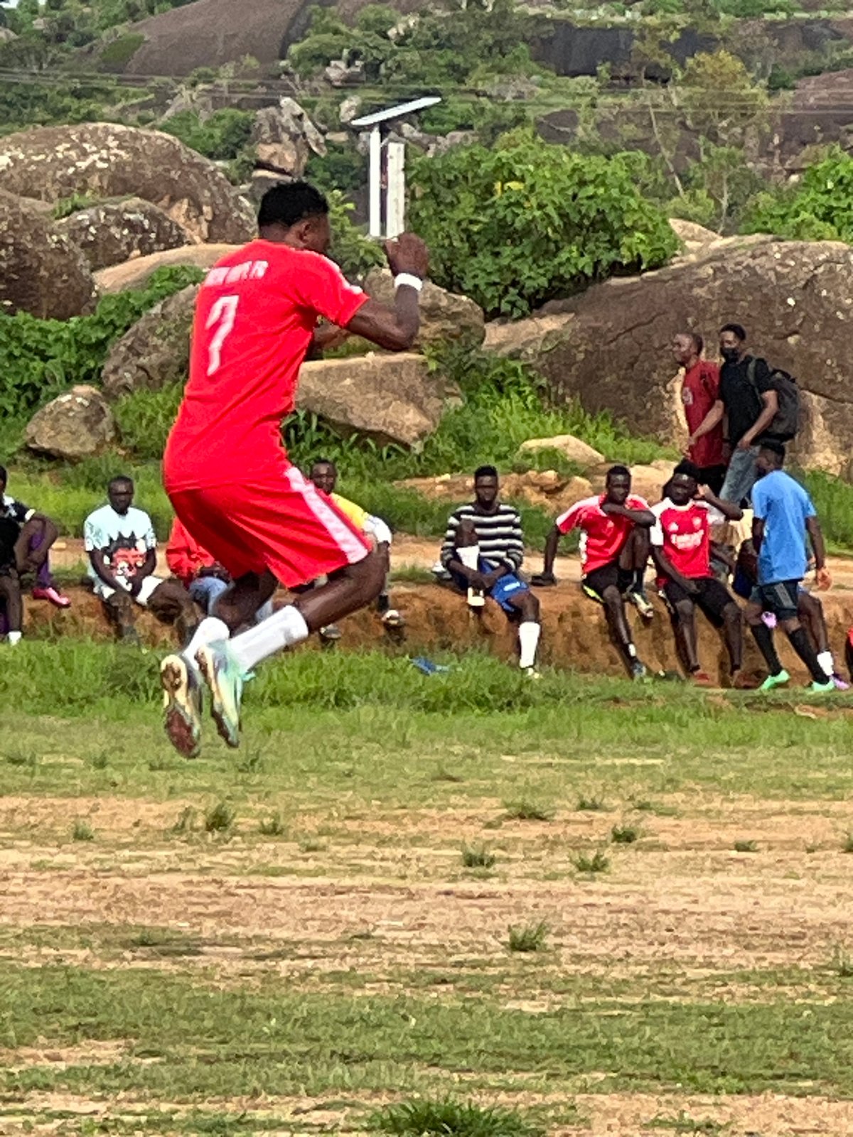 Football session in full swing on a Jos, Nigeria field