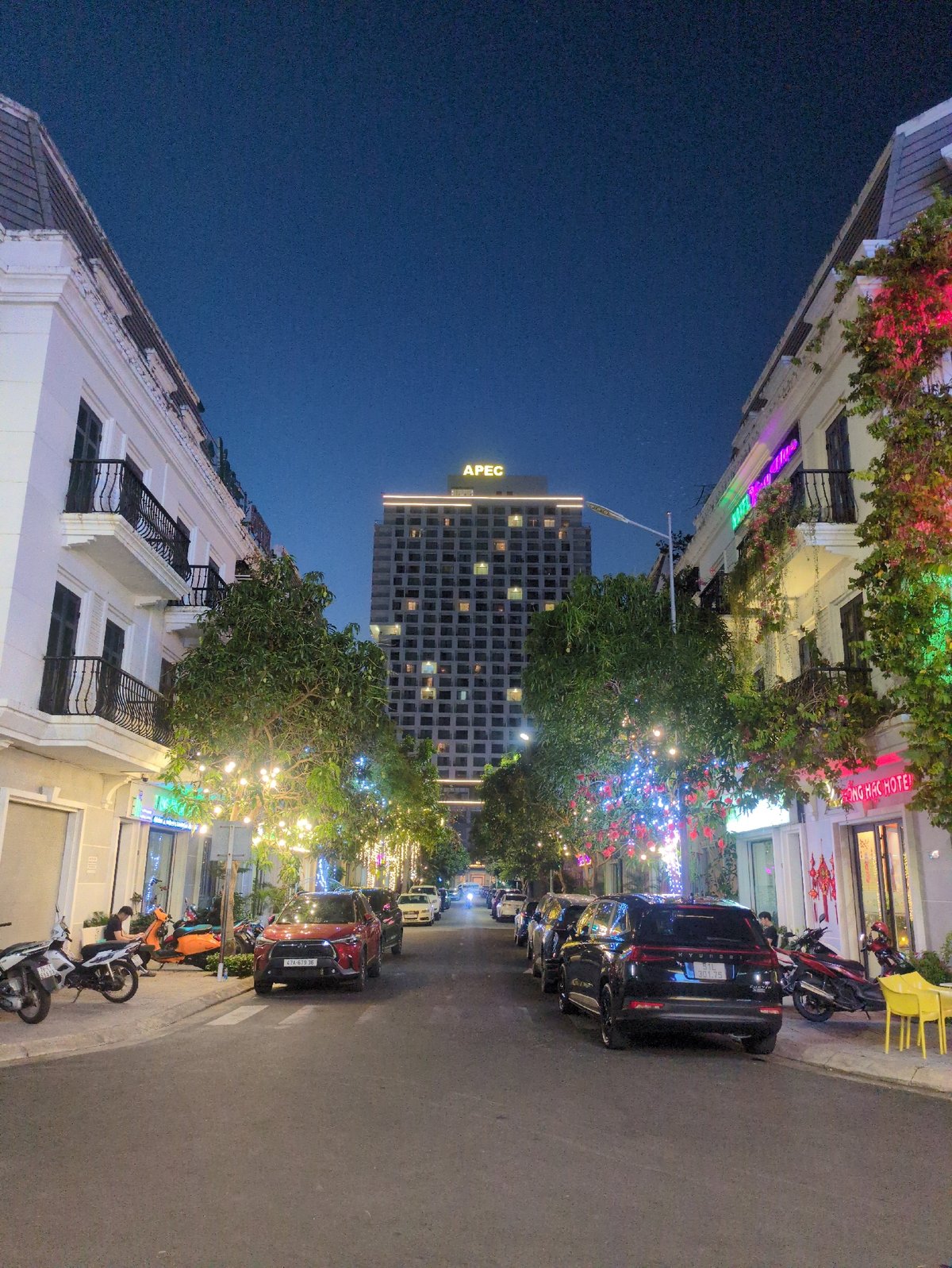 Nighttime street scenes documented in illuminated Tuy Hòa, Vietnam