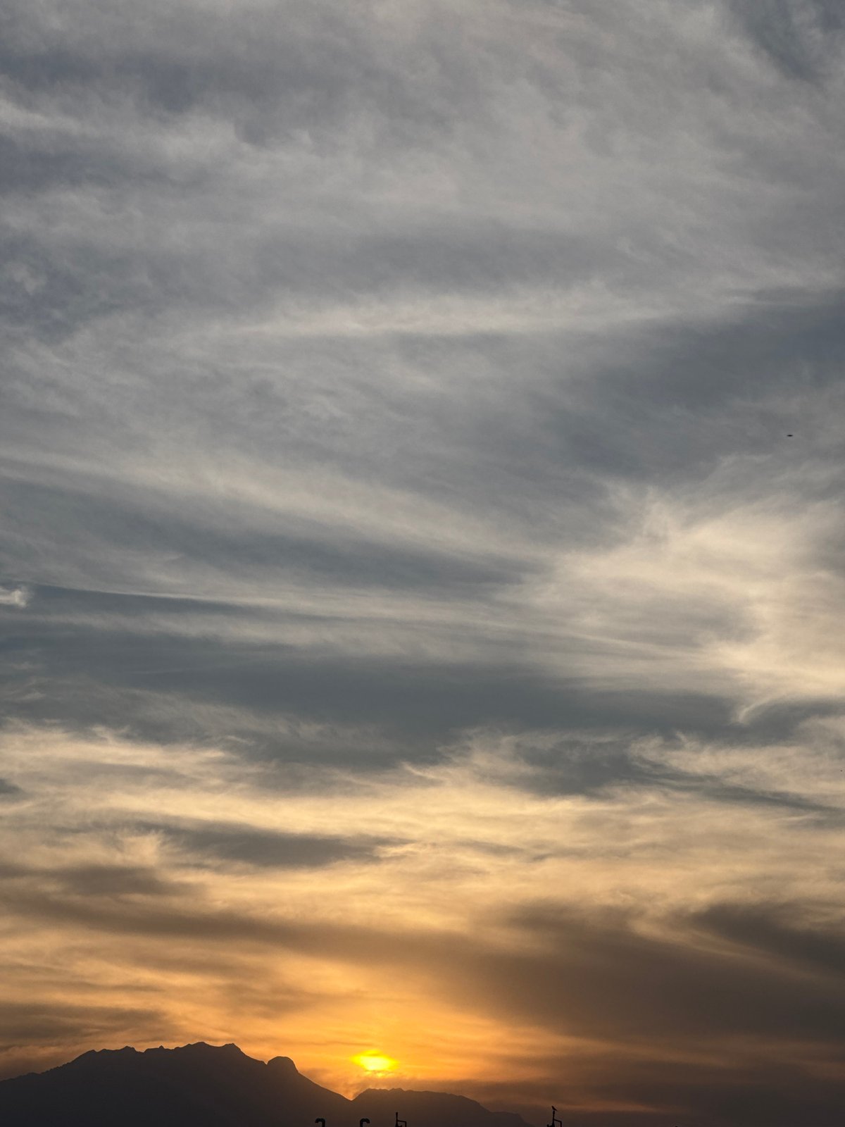Dawn or dusk captured over mountains in Ocotlán, Mexico