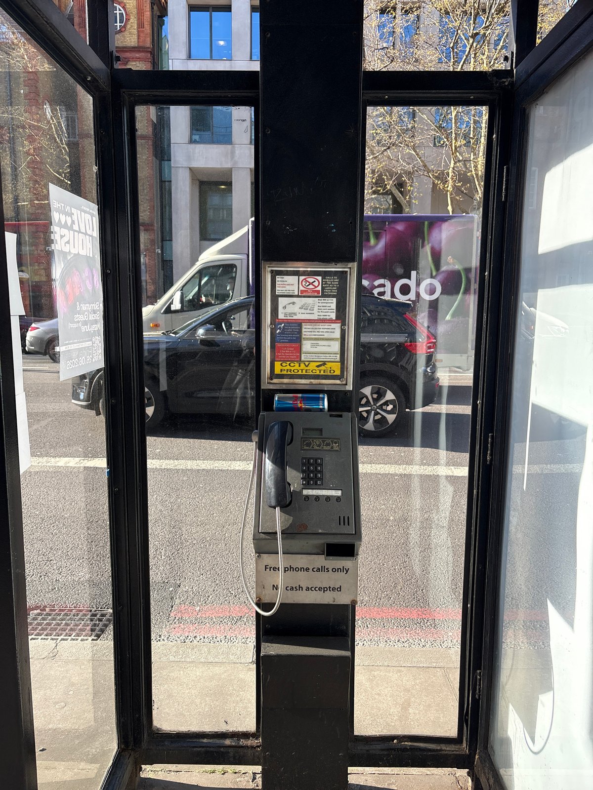 Traditional London phone booth offers free calls only