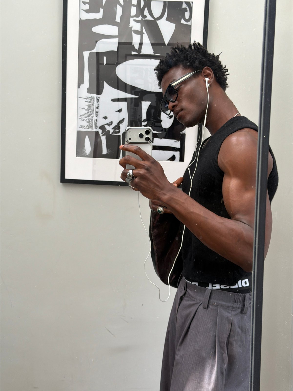 Mirror selfie series showing a styled fit in London