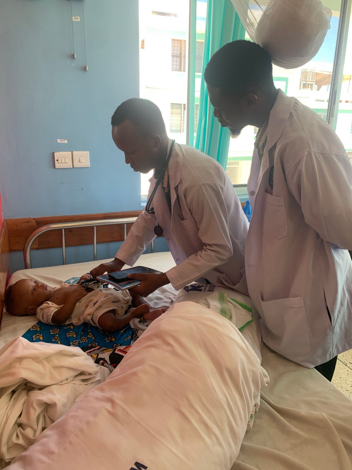 Healthcare worker photographed in Dar es-Salaam medical facility