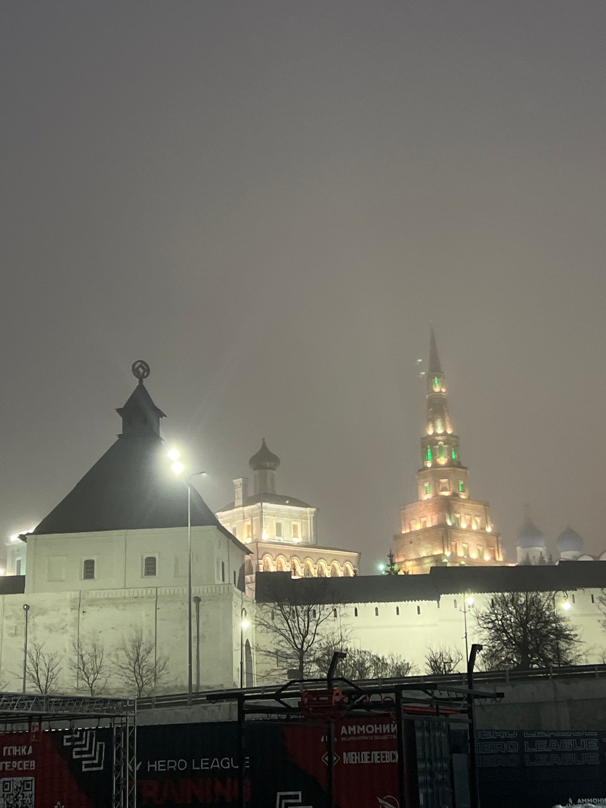 Foggy night blankets Kazan landmarks and wet streets
