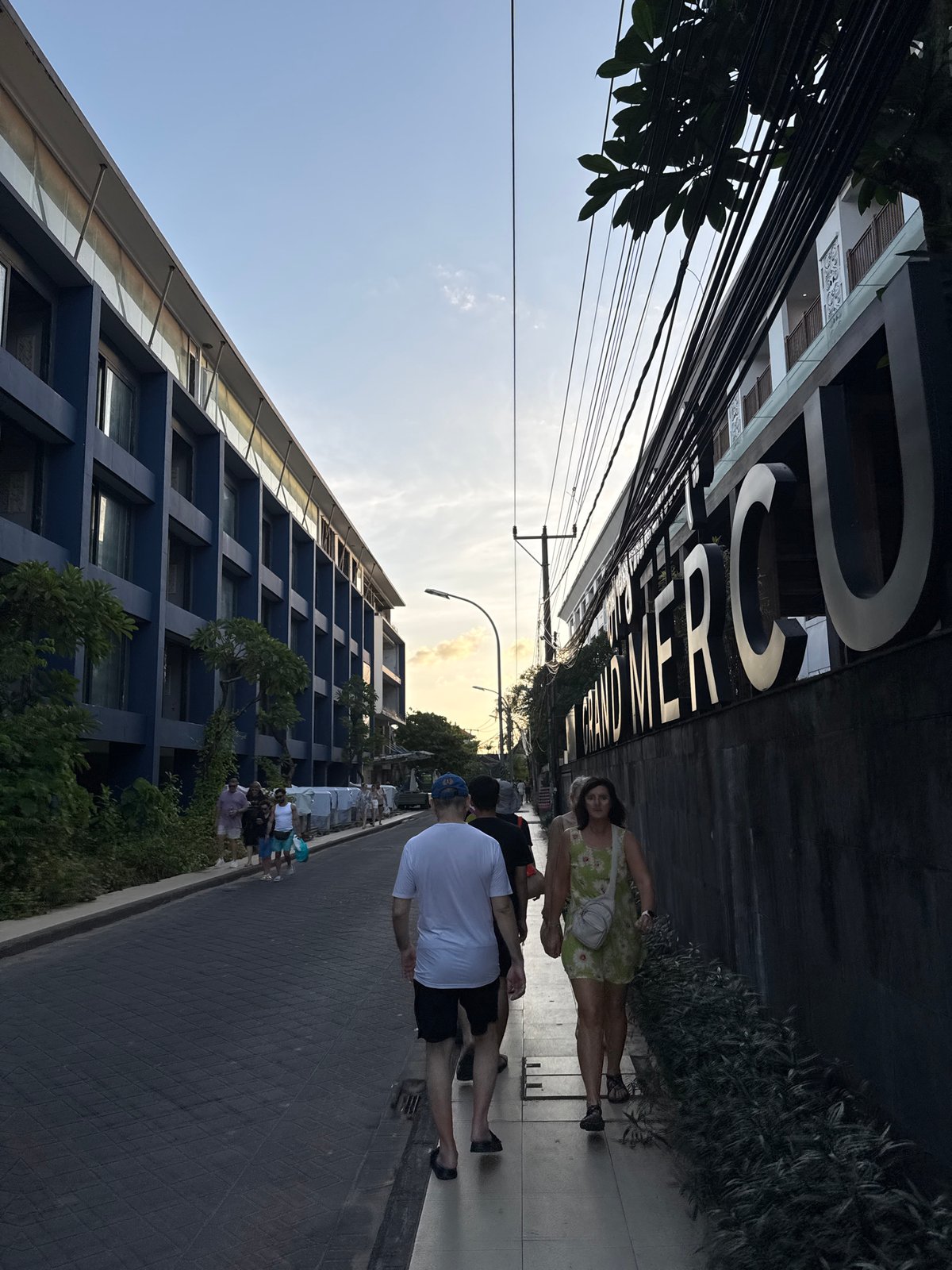Kuta street life at golden hour, from traffic to beachfront
