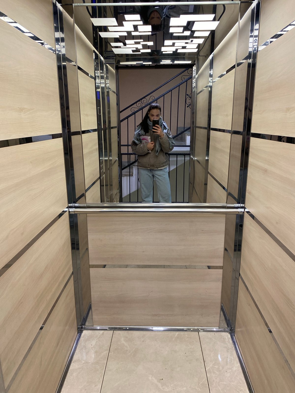 Ordinary moments captured in Novi Sad: elevator interior, sidewalk scene