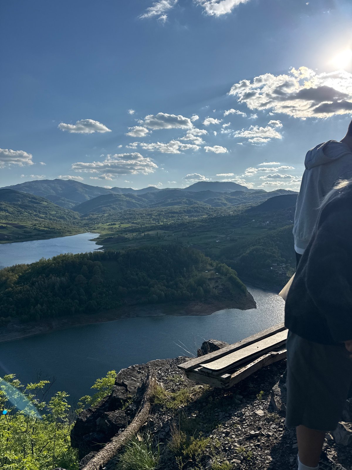 Visitors enjoy scenic mountain overlook at Lake Zaovine, Serbia