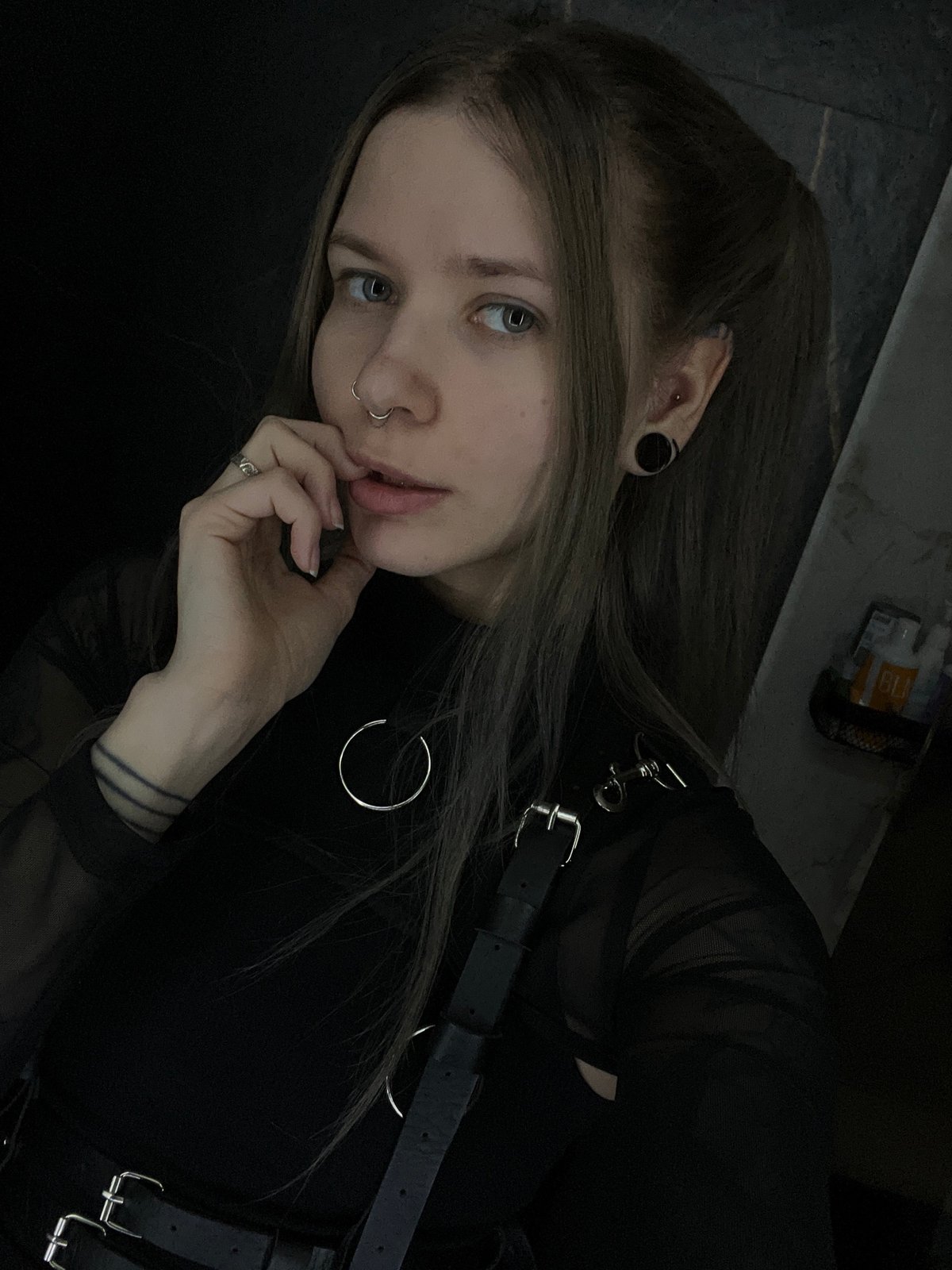 Person with piercings observed resting in Khimki, Russia