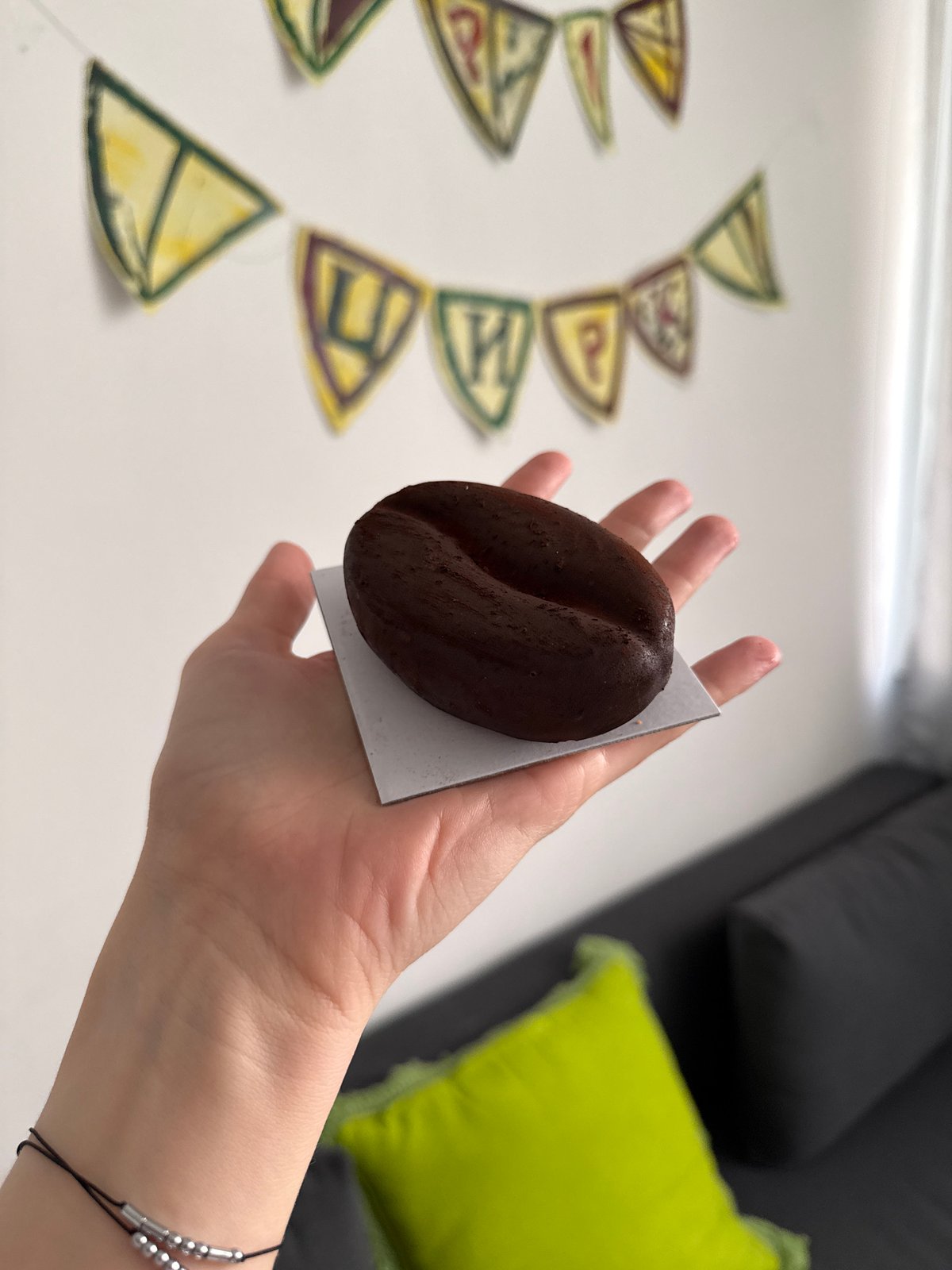 Person displays confections on paper squares in Ramat Gan