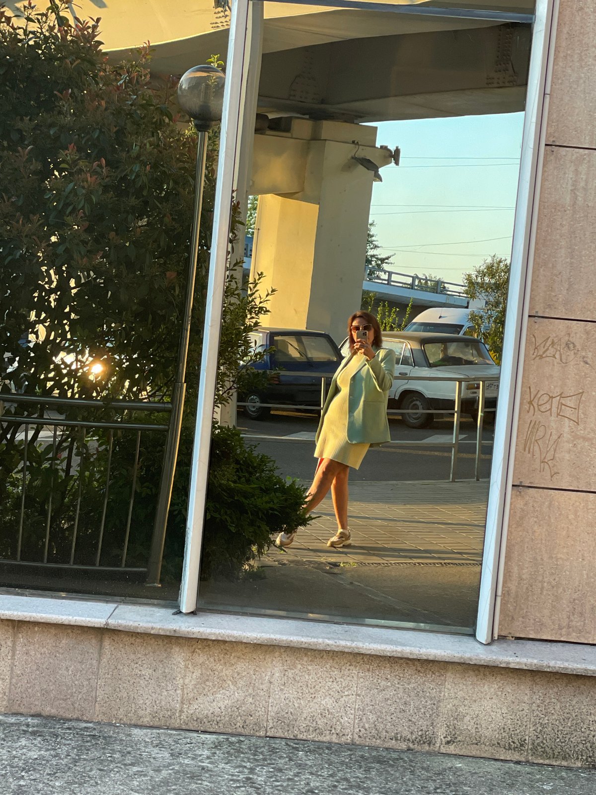 Woman shopping and taking selfies in Sochi malls