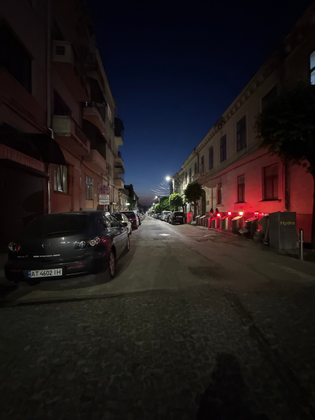 Evening streets of central Chernivtsi, bollards and landmarks lit up