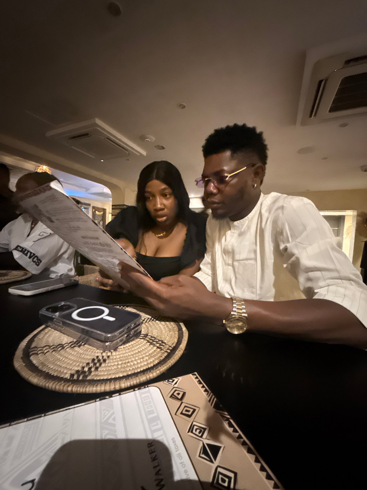 Evening dining and street vendor scenes captured in Ikoyi