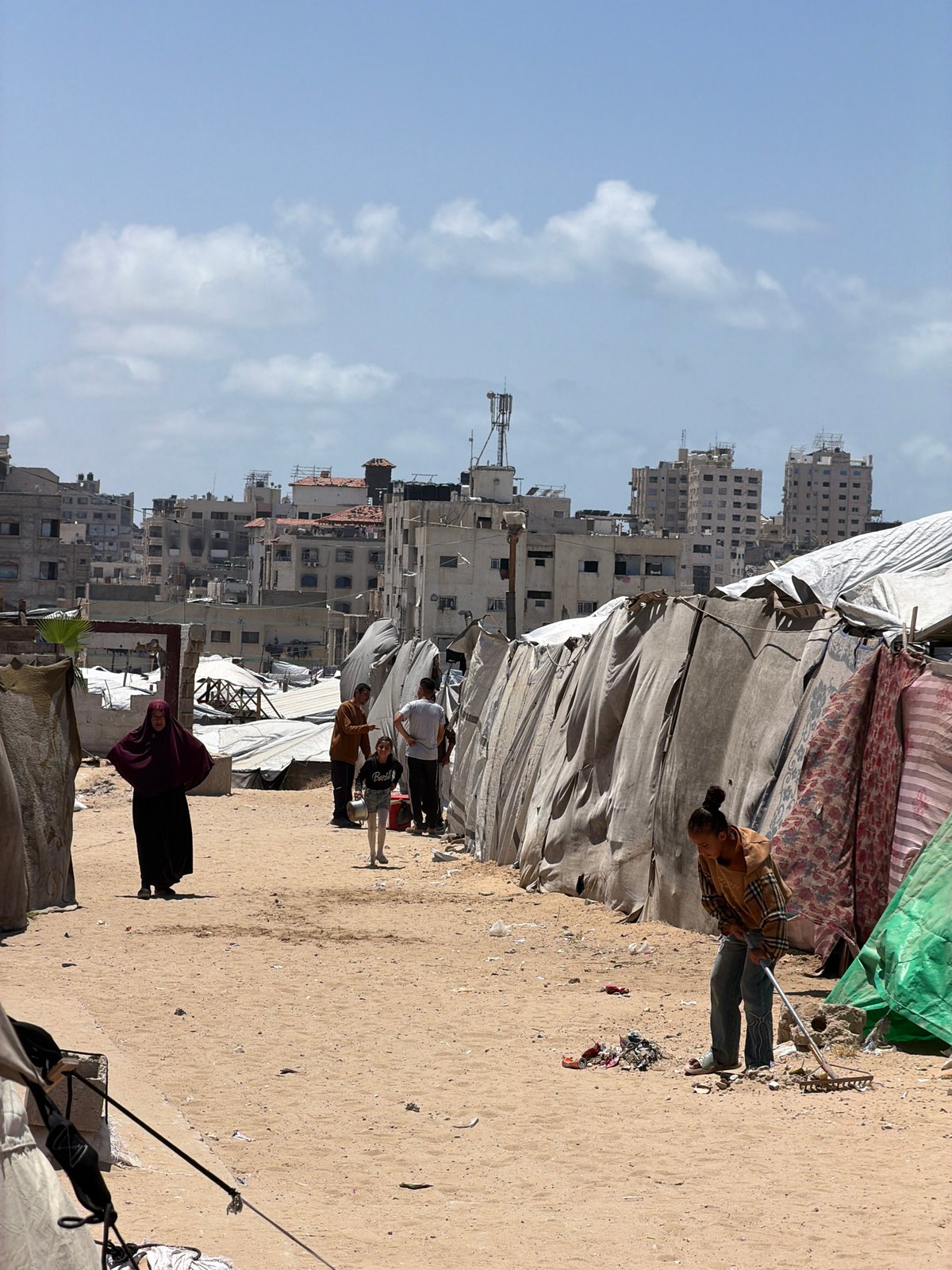 Witness documents damaged buildings, makeshift shelters in Gaza
