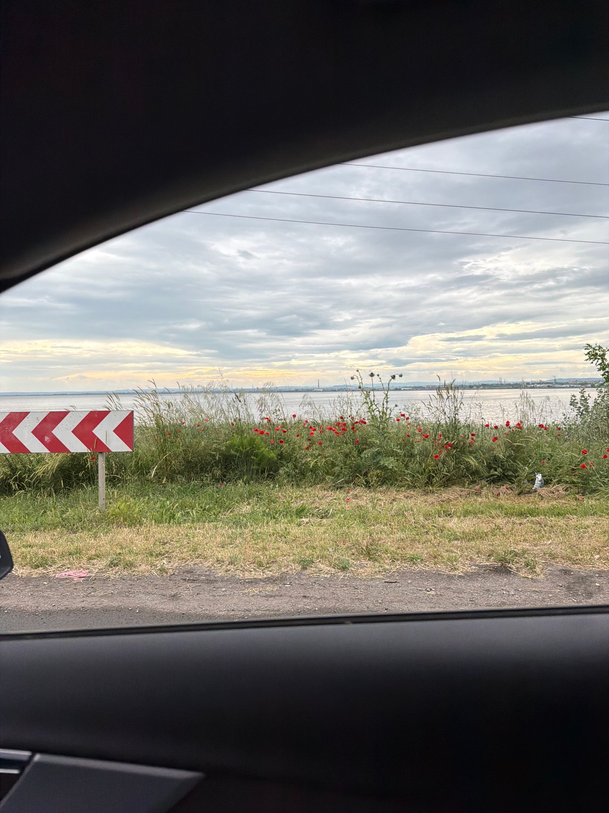 Driver documents roadway journey near Burgas waterway at 50km/h