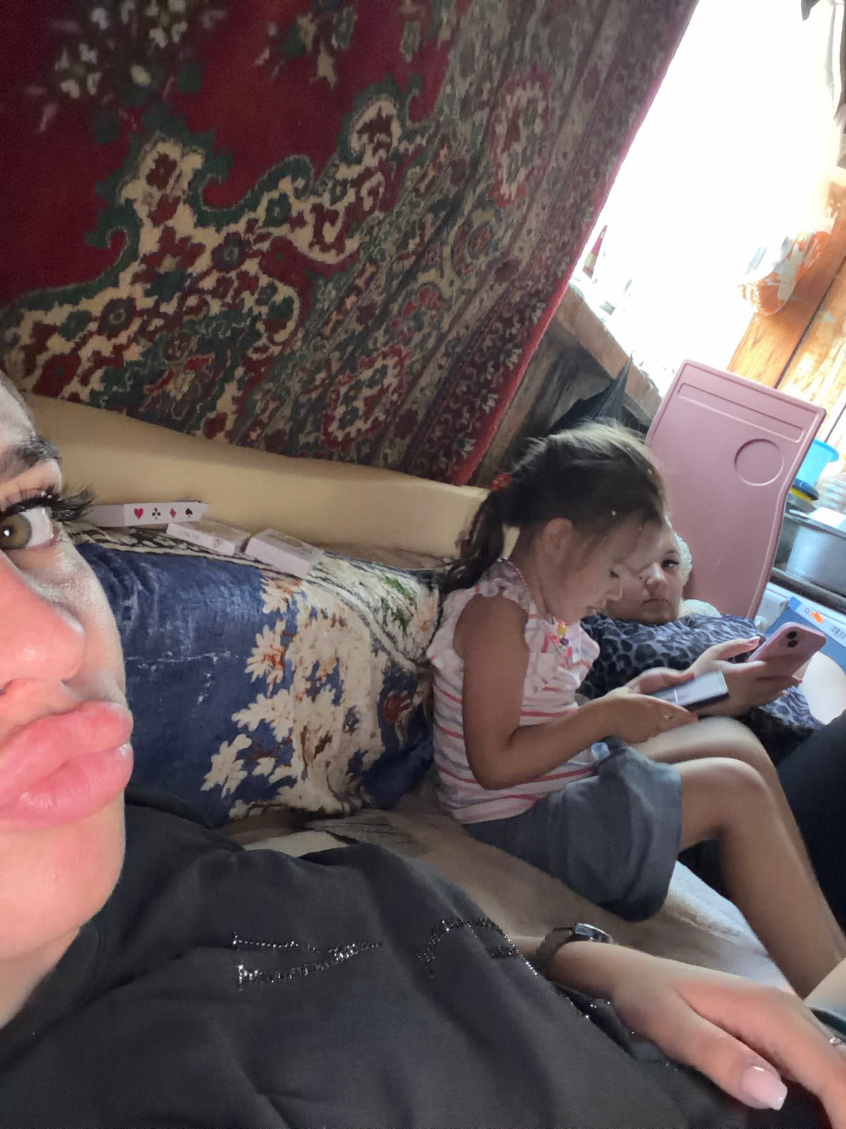 Casual indoor selfies from a home in Bolshoy Bukor