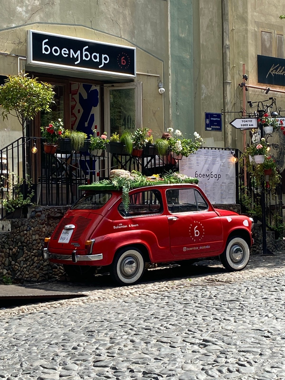 Flower-decorated vintage car spotted outside Belgrade's Skadarlija district bar