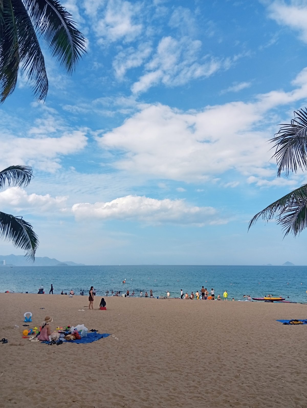 Busy morning on Nha Trang beach, Vietnam