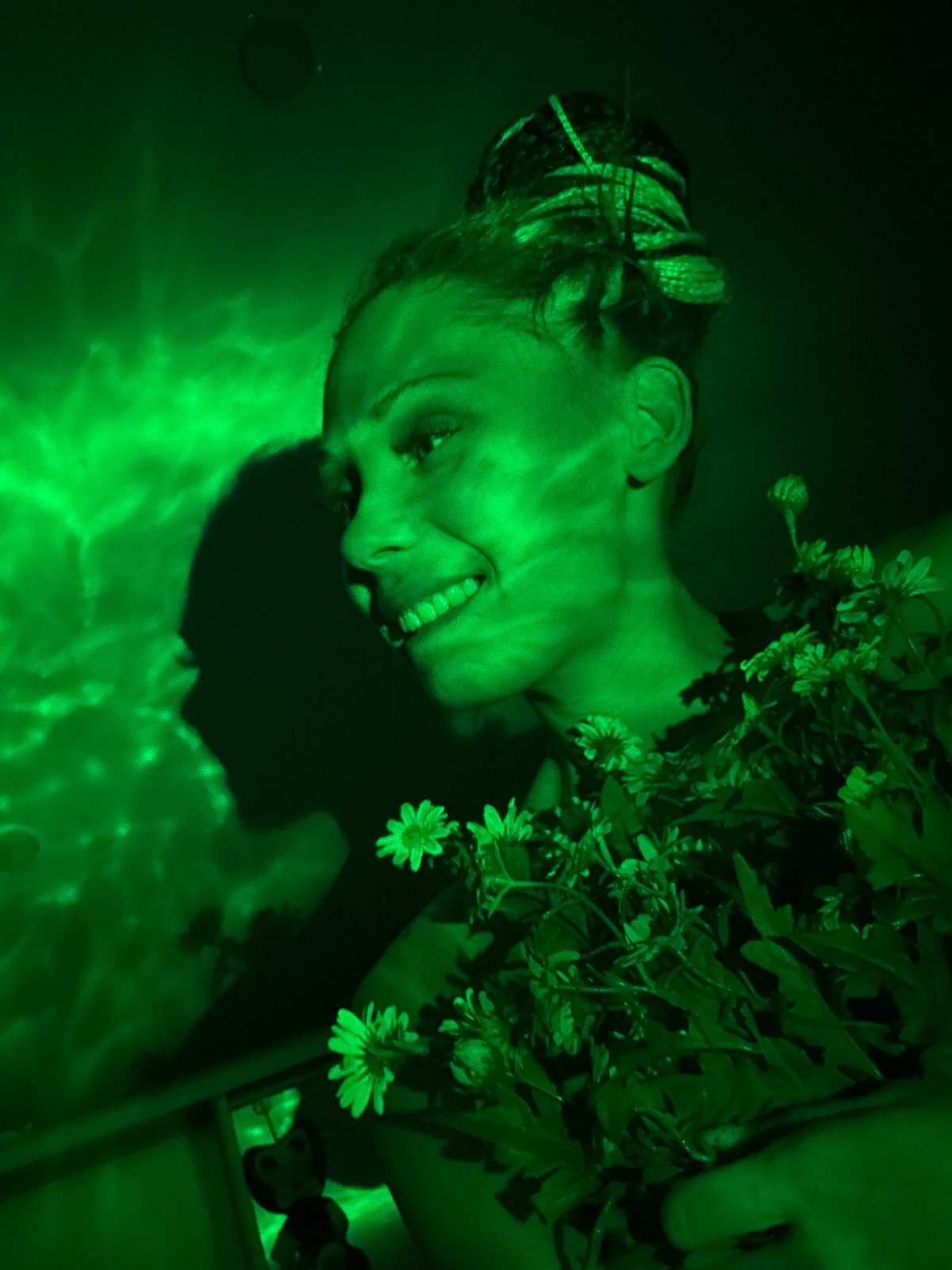 Person spotted in colorful lighting environment in Rusanovo