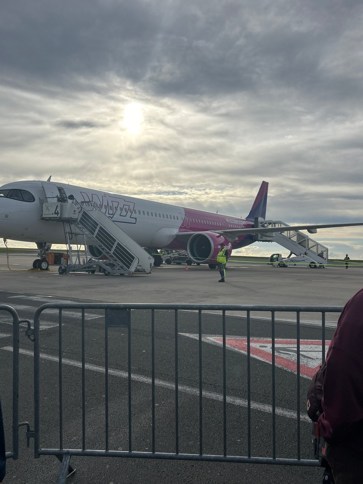 Evening airport scenes documented at Dortmund featuring Wizz Air