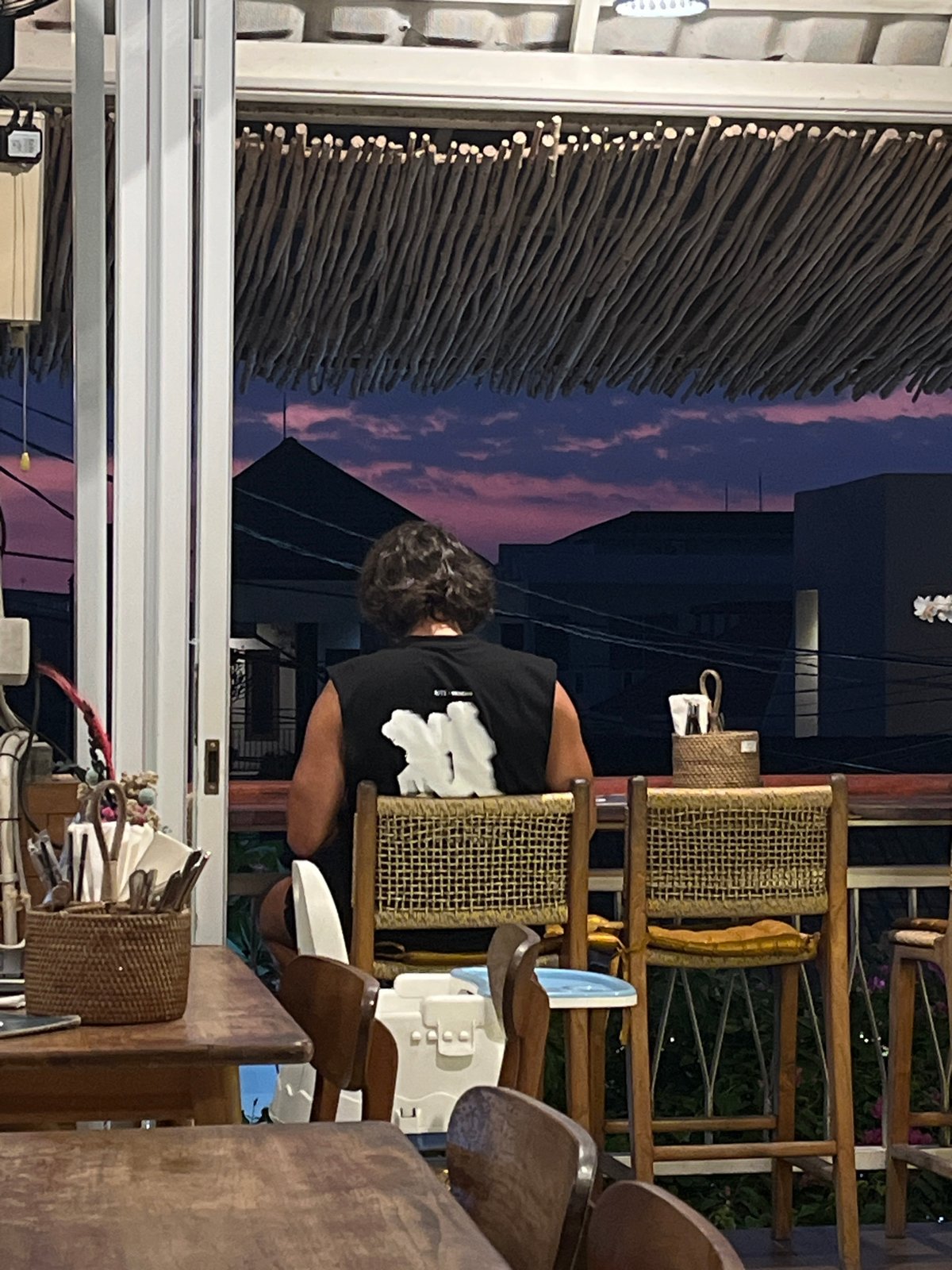 Social gathering at illuminated outdoor venue in North Kuta