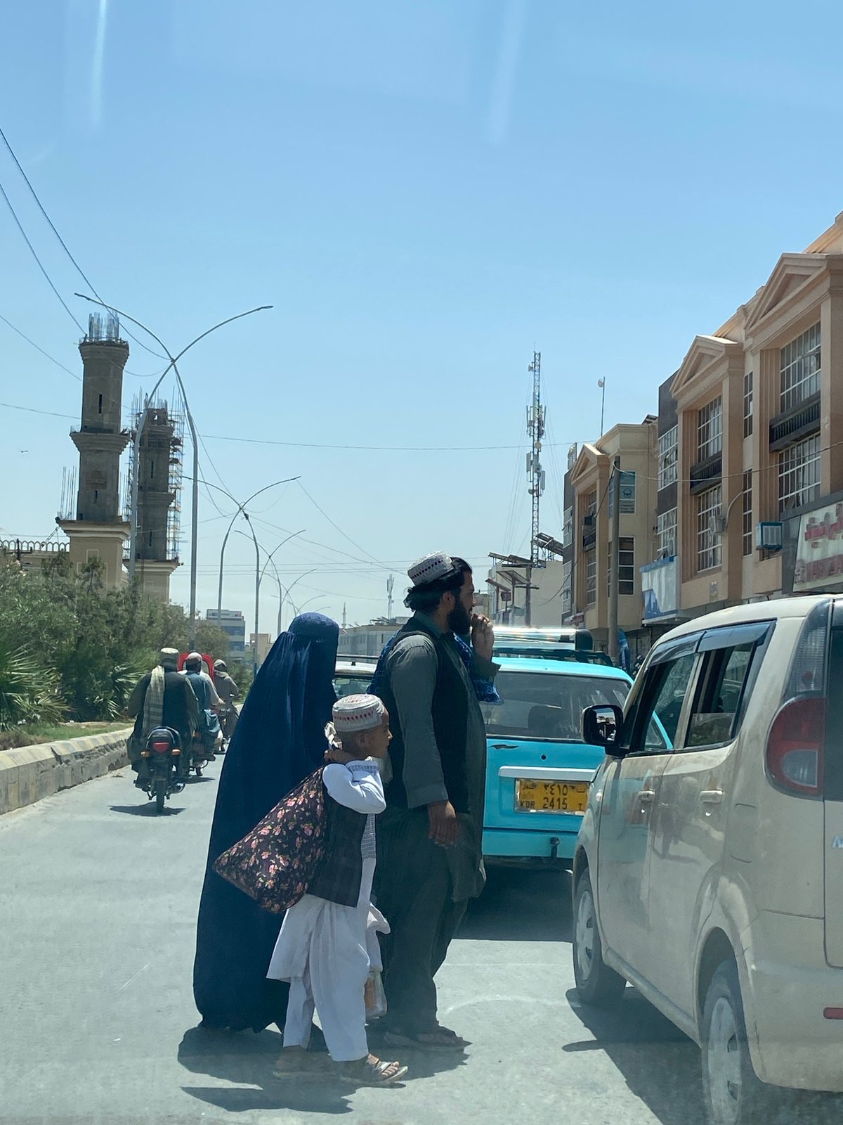 Kandahar street life and construction, with one flagged fake