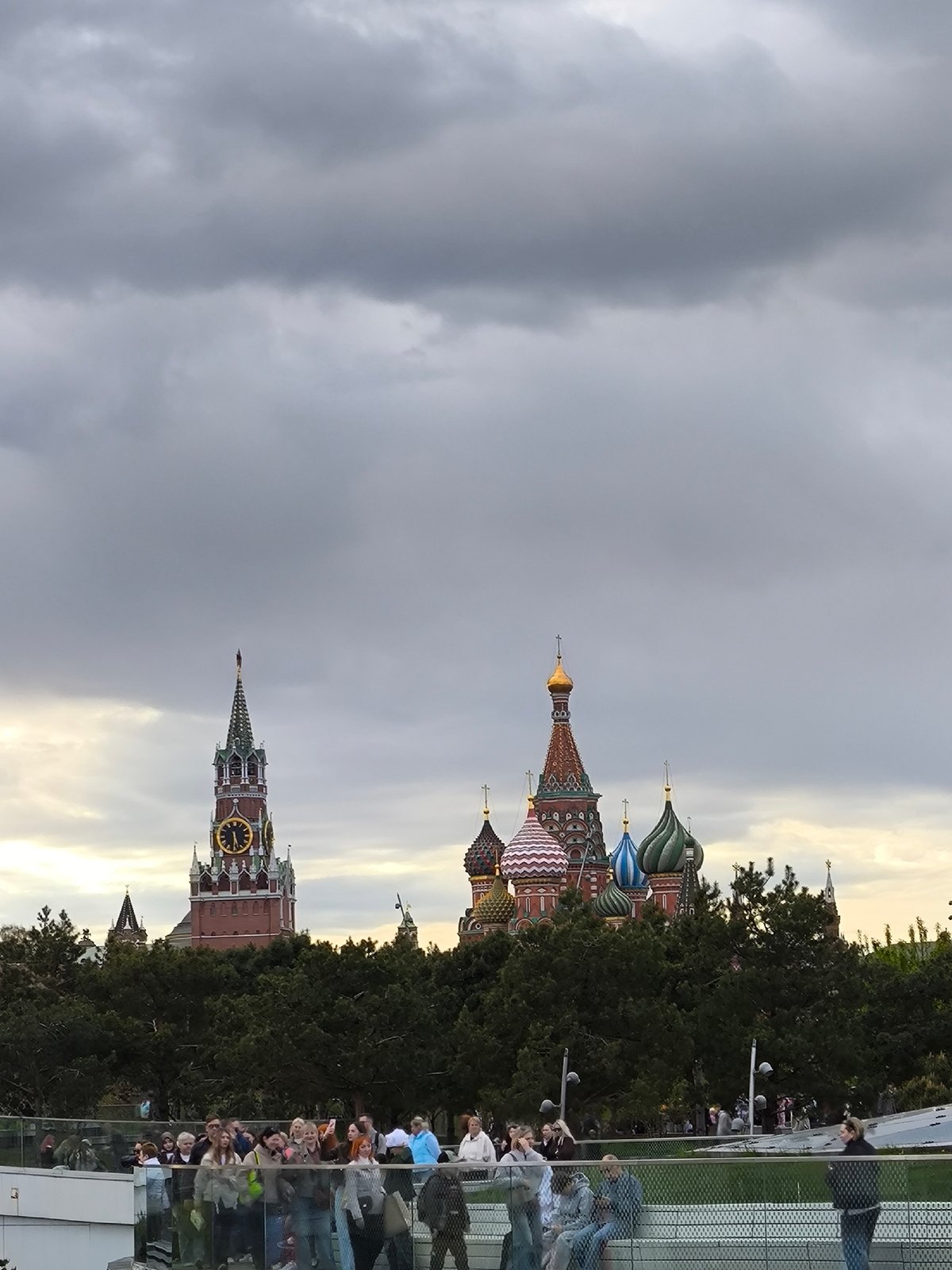 Moscow landmarks documented during overcast afternoon with patriotic displays