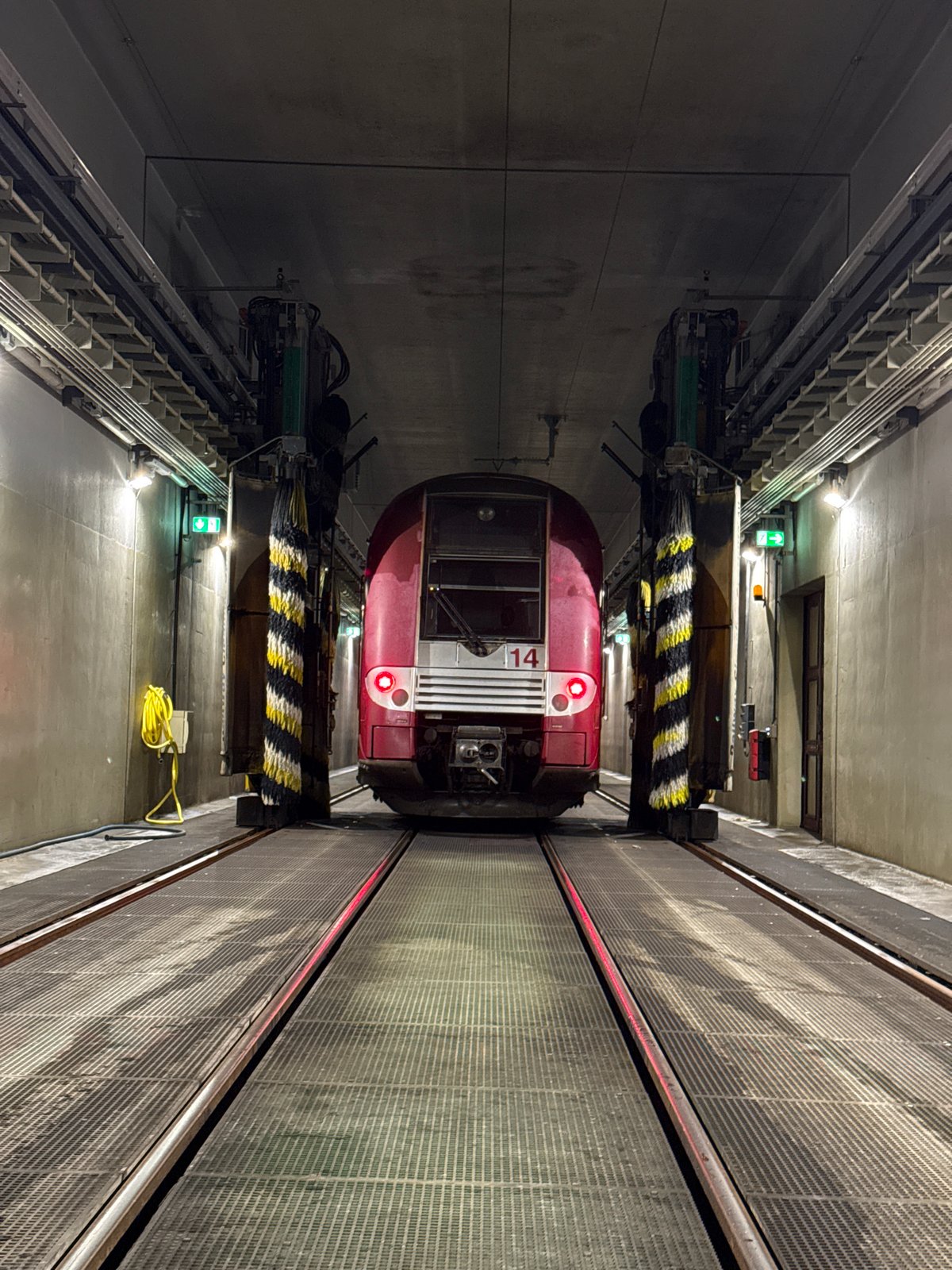 Train car undergoes washing in Luxembourg tunnel facility