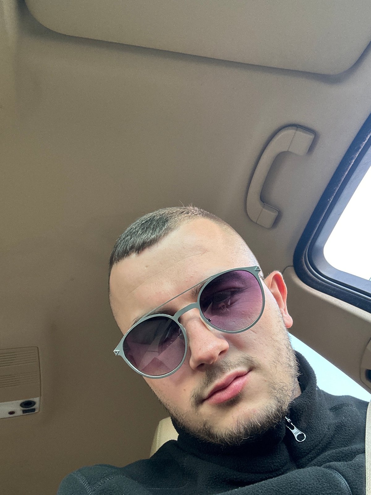 Man in sunglasses, residential area, dental clinic documented in Plovdiv