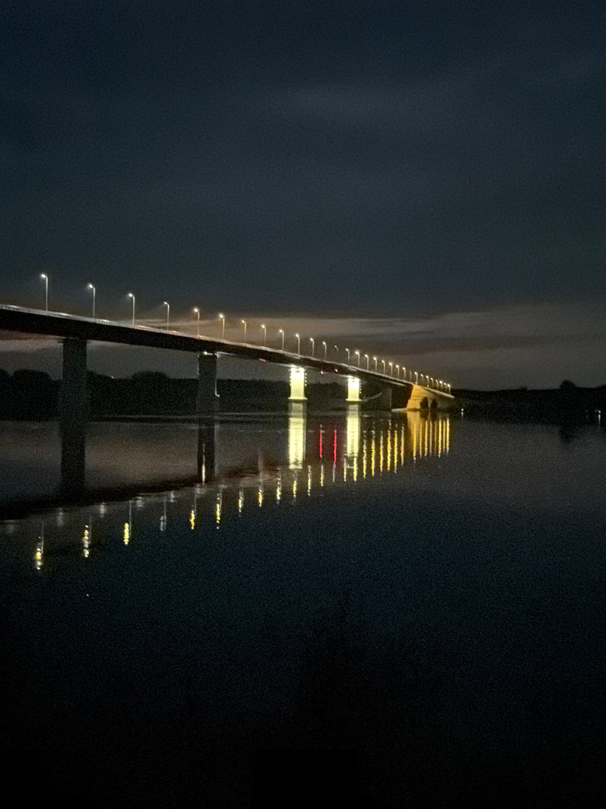 Riverside evening in Tarasovo: bridge, fishing, and an outdoor gathering